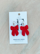 Load image into Gallery viewer, Red Embossed Bow w/ Silver Huggie Hoop