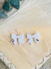 Load image into Gallery viewer, White Bow Dangle with Tiny Floral Accents