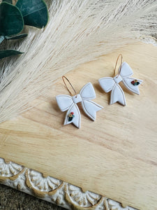 White Bow Dangle with Tiny Floral Accents